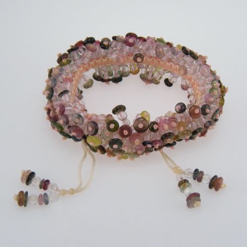 Hand woven bracelet with natural tourmalines of various colors